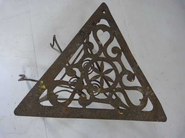 Georgian wrought iron trivet on pad feet with pierced design on top along with a simple swedish fire - Image 5 of 7