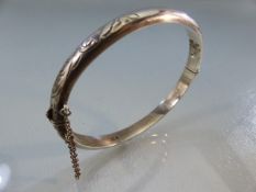 Hallmarked silver bangle by Smith, Ewen & Stylic Ltd, Birmingham 1964.