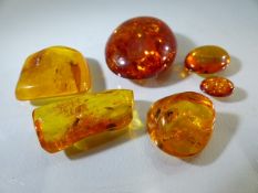 Selection of Loose Amber to include some set with insects. 25