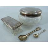 Hallmarked silver topped dressing table pots - one of oblong form and the other of circular form.