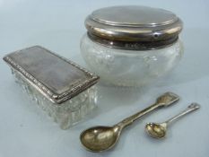 Hallmarked silver topped dressing table pots - one of oblong form and the other of circular form.