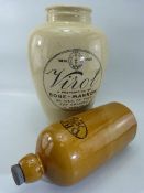 Victorian stone ware jar 'Visol' along with an advertising hot water bottle for DBC