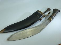 Nepalese Khukuri knife in scabbard