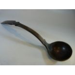 Carved horn ladle spoon with shaped handle