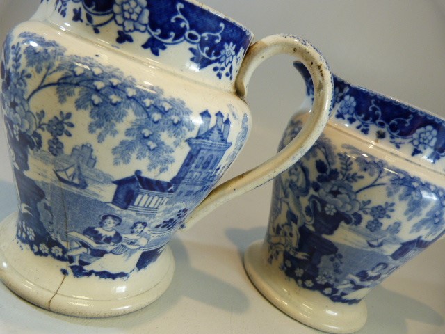 Pearlware - a pair of Antique c. 1825 transfer blue and white pouring jugs - printed with - Image 6 of 11