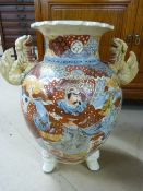 Large Japanese Satsuma vase decorated with Samurai on tripod feet with Foo dog handles