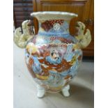 Large Japanese Satsuma vase decorated with Samurai on tripod feet with Foo dog handles