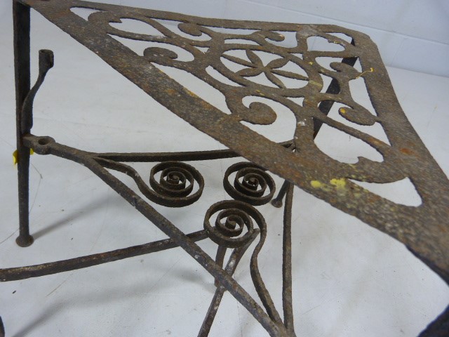 Georgian wrought iron trivet on pad feet with pierced design on top along with a simple swedish fire - Image 2 of 7