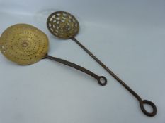 Two Victorian milk skimmers