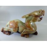Jade Carving. A large Chinese jade carving of a mythical beast (Qilin), (approx 32cm nose to tail)