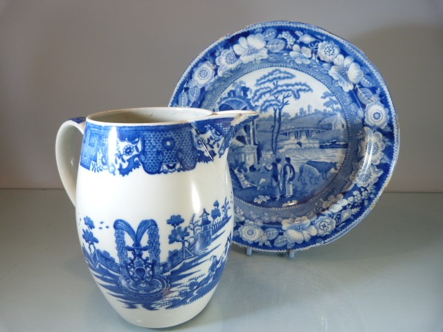 Staffordshire Pottery Blue and White pearl ware jug decorated with scenes of Royal Gardens along