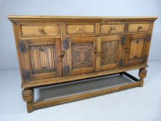 Oak sideboard with carved 4 draws and 4 cupboards