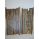 Antique carved Indian hardwood door panels. Carvings of a primitive form including Birds, men,