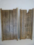 Antique carved Indian hardwood door panels. Carvings of a primitive form including Birds, men,