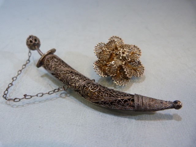 Unmarked white metal filigree knife and a filigree flower brooch - Image 2 of 3