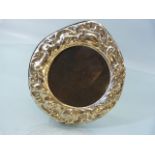 Hallmarked Silver (925) circular photo frame decorated with scrolls.