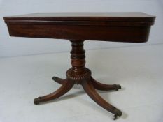 Mahogany folding card table with applied metal fittings to castor feet