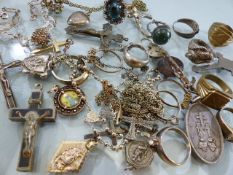 Large quantity of Silver and Silver coloured jewellery, including rings, crucifix, pendants etc