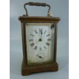 Brass Cased carriage clock, probably french. Missing Hour hand, along with a subsidiary dial. 5