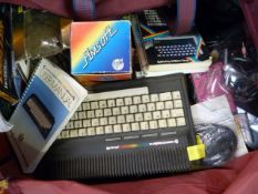 Lot comprising of Commodore 64 and a ZX Spectrum along with large quantity of games and controllers