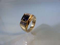 Gents 14ct ring set with large sapphire and three small Diamonds to Side. Approx weight 7.2g