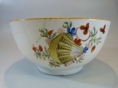 Staffordshire creamware slops bowl decorated with scallop shells and flora. Red painted mark to