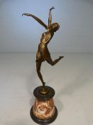 Art Deco Style Bronze of a prancing lady with outstretched arms and leg, stamped `BRONZE GARANTO