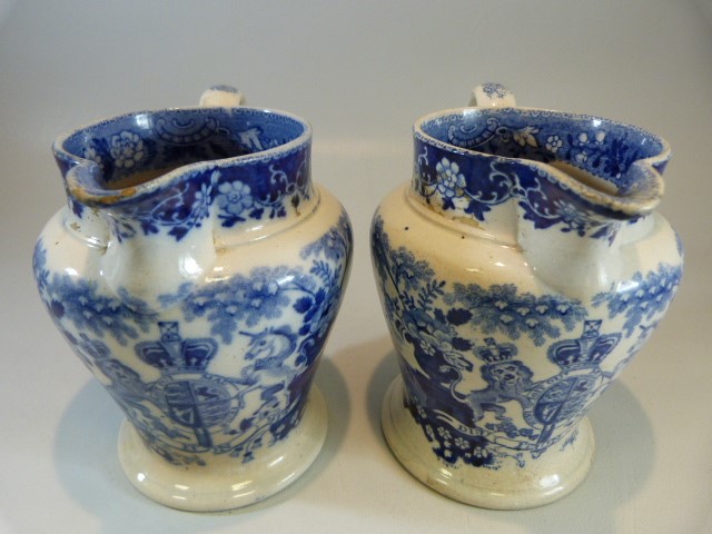 Pearlware - a pair of Antique c. 1825 transfer blue and white pouring jugs - printed with - Image 3 of 11