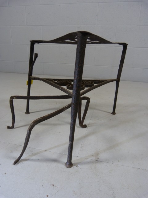 Georgian wrought iron trivet on pad feet with pierced design on top along with a simple swedish fire - Image 7 of 7