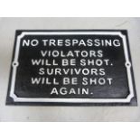 Vintage cast iron 'No Trespassing' sign