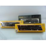 Three boxed HO Locomotives: PEMCO 4001 Santa FE; MEHANO 1523 Atlantic Coastline & 5125 Canadian