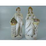 Parian figures - Lady and a Man both carrying flowers - unmarked.