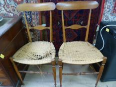 Two antique turned wooden stick chairs
