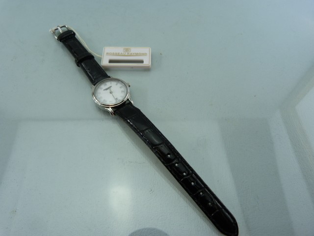 Rosseau Raymond ladies wrist watch. Off White face with silver tone Roman Numeral chapter ring. - Image 2 of 4