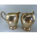 Large pair of Bulbous good quality silver plate jugs with reeded design to base and rim with a large