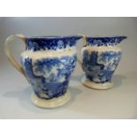 Pearlware - a pair of Antique c. 1825 transfer blue and white pouring jugs - printed with