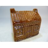 Treacle ware salt Glaze brick cottage Mid Victorian modelled as a Money box.