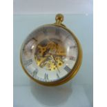 Reproduction desk clock in the form of a magnifying ball