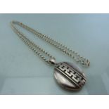 Silver coloured Locket and long silver coloured Belcher chain