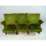 Three Folding 20th century Cinema theatre seats with cast iron ends and green Velour upholstery.