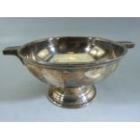 Small Twin handled hallmarked silver bowl in the Art Deco manner. Marks for Sheffield James