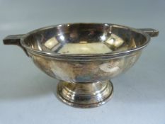 Small Twin handled hallmarked silver bowl in the Art Deco manner. Marks for Sheffield James