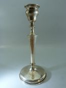 Hallmarked silver weighted candlestick - London.
