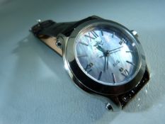 Ladies Gem Nova watch with leather strap. The face of Mother of Pearl set with steel baton markers