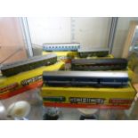 Five Schicht HO/00 gauge carriages and coaches, all in original boxes.