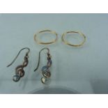 Sterling silver musical note earrings and a pair of Gold hoops