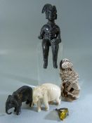 Trinket pieces - Bronze figure of a seated man, Lead Elephant and one other - along with a piece