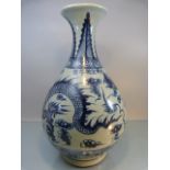 Large Chinese Blue & White Bottle shaped vase depicting dragons and a six figure character mark to