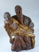 Pieta of the Virgin Mary Late 15th Century. Depicting Black Madonna carved wood and finished to both