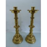 Alter heavy brass candle sticks with pierced work